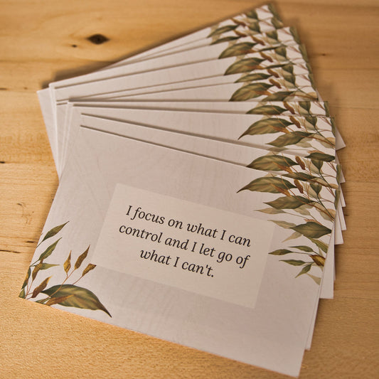 Spread of affirmation cards laid out on tabletop